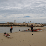 Paddlers On The Beach At Tantabiddi By Colin Priest