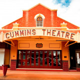 Constructed of bricks salvaged from several old Coolgardie Hotels and with stage, fly tower, and pressed metal ceiling from the Tivoli Theatre in Coolgardie, Cummins Theatre opened in Merredin on the 11th of October 1928. Brewer James Cummins had the theatre built. He and later, his daughter Alice, operated a brewery in Merredin until the 1940’s. Their graves can be seen at the Pioneer Cemetery. The Theatre archives boast one of the best collections of Australian performers in the State.  Tours of the theatre are available Mon - Fri 10am - 4pm.
