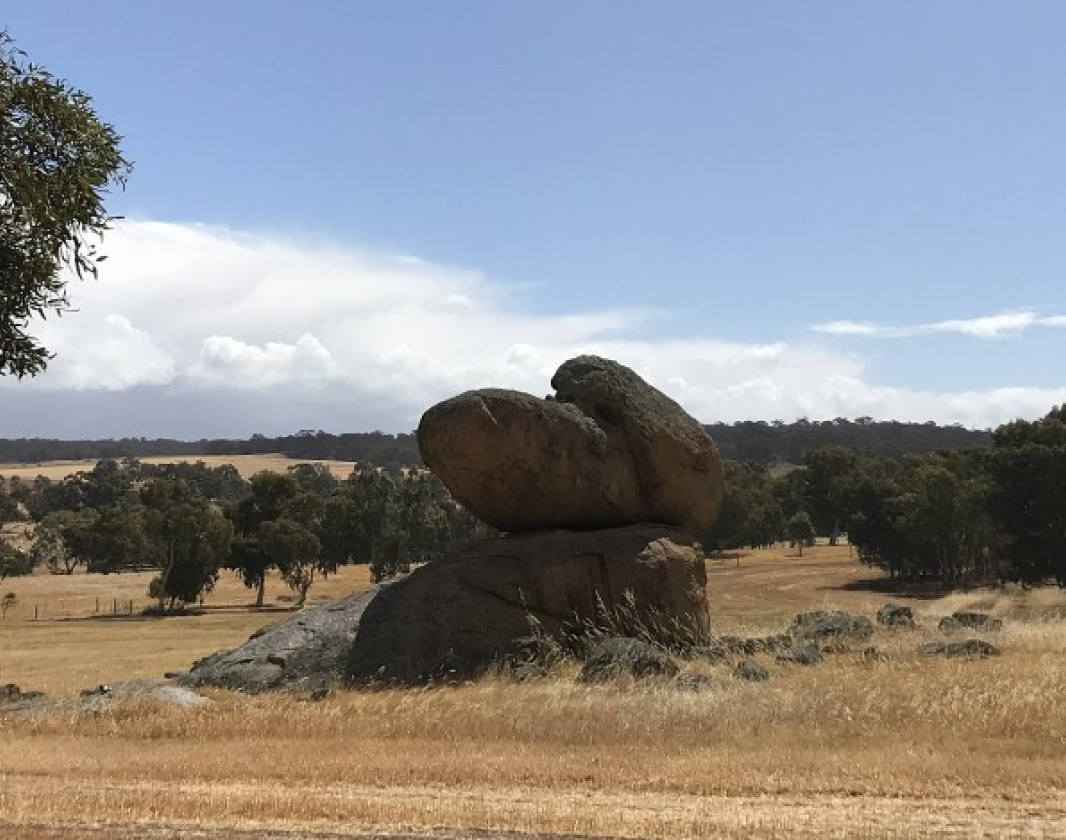 Turn left into  Qualen West Road to find a site of Noongar significance. Timeless, unchanging natural landmarks were often used as waymarkers by the Ballardong Noongar people and still hold significant meanings in traditional culture. Sometimes called 'the Balancing Boot' today - what do you see?